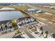 Community of townhouses next to a lake at 2391 Summerlit St, Lutz, FL 33558