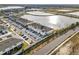 Luxury townhomes near a lake and main road at 2391 Summerlit St, Lutz, FL 33558