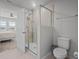 Bathroom with shower and toilet at 2391 Summerlit St, Lutz, FL 33558
