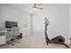Bedroom with elliptical and workspace at 2391 Summerlit St, Lutz, FL 33558