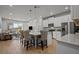 Open concept kitchen with island and breakfast bar at 2391 Summerlit St, Lutz, FL 33558