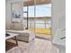 Living room with sectional sofa and lake view at 2391 Summerlit St, Lutz, FL 33558