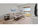 Living room with lake view and comfy seating at 2391 Summerlit St, Lutz, FL 33558