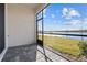 Spacious screened porch overlooking a lake at 2391 Summerlit St, Lutz, FL 33558