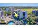 Aerial view of condo building near golf course at 6 Belleview Blvd # 105, Belleair, FL 33756