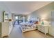 Main bedroom with king-size bed and plenty of closet space at 6 Belleview Blvd # 105, Belleair, FL 33756