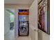 Small laundry room with washer and dryer at 6 Belleview Blvd # 105, Belleair, FL 33756