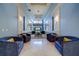 Lobby with seating area and large artwork at 6 Belleview Blvd # 105, Belleair, FL 33756