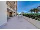 Relaxing patio with table and chairs, offering ample space at 6 Belleview Blvd # 105, Belleair, FL 33756
