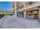 Relaxing patio with outdoor furniture and partial view at 6 Belleview Blvd # 105, Belleair, FL 33756