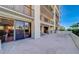 Spacious patio with seating area and partial ocean view at 6 Belleview Blvd # 105, Belleair, FL 33756