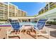 Relax by the pool with lounge chairs at 6 Belleview Blvd # 105, Belleair, FL 33756