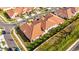 Aerial view of townhome, showcasing its roofline and location at 17554 Holly Well Ave, Wimauma, FL 33598