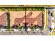 Aerial view of two-story townhome with tile roof at 17554 Holly Well Ave, Wimauma, FL 33598