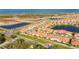 Wide aerial view of the home and neighborhood at 17554 Holly Well Ave, Wimauma, FL 33598