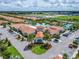 Aerial view of community clubhouse and amenities at 17554 Holly Well Ave, Wimauma, FL 33598