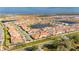 Wide aerial view of the home and neighborhood at 17554 Holly Well Ave, Wimauma, FL 33598