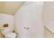 Small powder room with a modern toilet and contemporary decor at 17554 Holly Well Ave, Wimauma, FL 33598