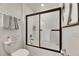 Simple bathroom with white tile and a tub/shower at 17554 Holly Well Ave, Wimauma, FL 33598
