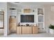 Built-in entertainment center with ample storage at 17554 Holly Well Ave, Wimauma, FL 33598