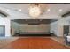 Event space with a stage and dance floor at 17554 Holly Well Ave, Wimauma, FL 33598