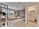 Open loft with contemporary furniture and en-suite bath at 17554 Holly Well Ave, Wimauma, FL 33598