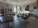 Community clubhouse craft room with tables and supplies at 17702 Cresswind Ter, Bradenton, FL 34211