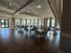 Community clubhouse dining room with tables and chairs at 17702 Cresswind Ter, Bradenton, FL 34211