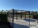 Enclosed dog park with seating and shade umbrellas at 17702 Cresswind Ter, Bradenton, FL 34211