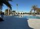 Large community pool with multiple seating areas at 17702 Cresswind Ter, Bradenton, FL 34211