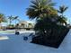 Relaxing pool area with shaded seating and landscaping at 17702 Cresswind Ter, Bradenton, FL 34211