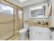 Clean bathroom with updated vanity and shower at 3806 Gulf Of Mexico Dr # C211, Longboat Key, FL 34228
