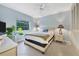 Comfortable guest bedroom with a window at 3806 Gulf Of Mexico Dr # C211, Longboat Key, FL 34228