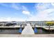 Community boat dock with multiple slips for resident use at 3806 Gulf Of Mexico Dr # C211, Longboat Key, FL 34228