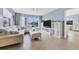 Living room with comfortable seating and ocean views at 3806 Gulf Of Mexico Dr # C211, Longboat Key, FL 34228