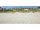 Expansive sandy beach with ocean and building view at 3806 Gulf Of Mexico Dr # C211, Longboat Key, FL 34228
