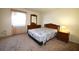 Bright bedroom with double bed, dresser, and ample closet space at 4315 Aegean Dr # 110C, Tampa, FL 33611