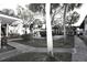 Relaxing courtyard with walkways and mature trees at 4315 Aegean Dr # 110C, Tampa, FL 33611