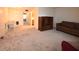 Open living and dining area with carpeted floors at 4315 Aegean Dr # 110C, Tampa, FL 33611