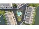 Community pool and surrounding townhomes from above at 4338 Spinnaker Cove Ln, Tampa, FL 33615