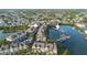 Aerial view of townhouses, pool, and boat docks at 4338 Spinnaker Cove Ln, Tampa, FL 33615