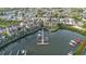 Aerial view of waterfront townhouses with private boat docks at 4338 Spinnaker Cove Ln, Tampa, FL 33615