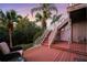 Spacious back deck with wooden stairs leading to the yard at 4338 Spinnaker Cove Ln, Tampa, FL 33615