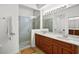 Spa-like bathroom with walk-in shower and double sinks at 4338 Spinnaker Cove Ln, Tampa, FL 33615