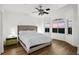 Spacious bedroom with large windows offering sunset views at 4338 Spinnaker Cove Ln, Tampa, FL 33615