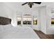 Bright bedroom featuring a comfortable bed and sunset view at 4338 Spinnaker Cove Ln, Tampa, FL 33615