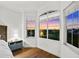Bedroom with a stunning sunset view from bay windows at 4338 Spinnaker Cove Ln, Tampa, FL 33615
