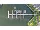Aerial view of multiple boat slips at a marina at 4338 Spinnaker Cove Ln, Tampa, FL 33615
