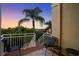 Private deck with seating, offering scenic sunset views at 4338 Spinnaker Cove Ln, Tampa, FL 33615