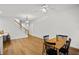 Bright dining area with hardwood floors and a charming table set for four at 4338 Spinnaker Cove Ln, Tampa, FL 33615
